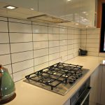white gloss kitchen stone bench tops designer breakfast bar Ballarat cabinetry joinery design